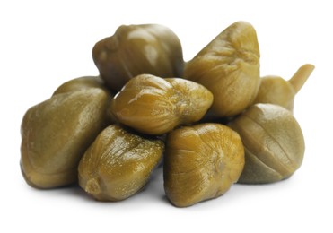 Pile of delicious pickled capers on white background