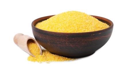Photo of Raw cornmeal in bowl and scoop isolated on white
