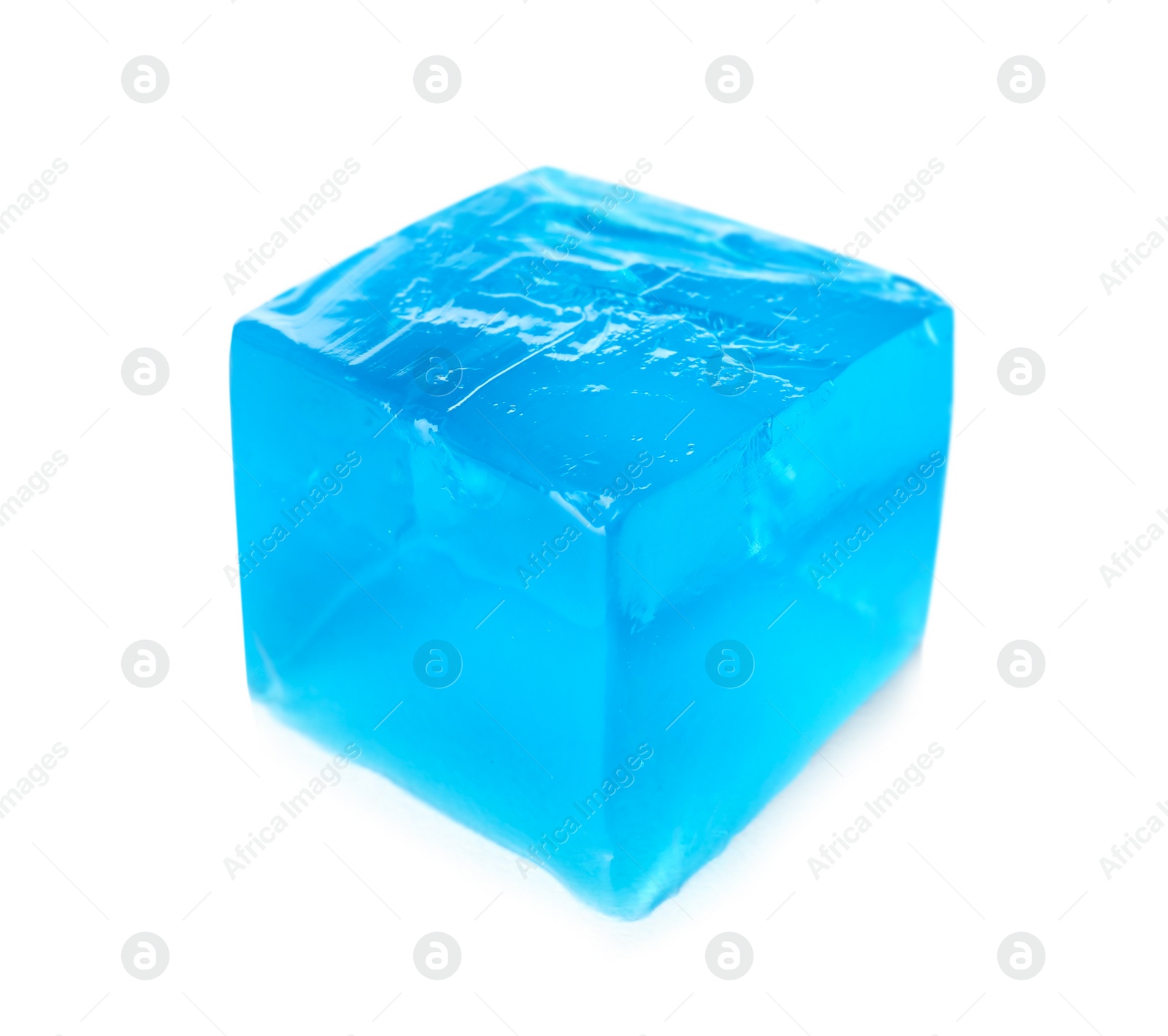 Photo of Delicious blue jelly cube on white background