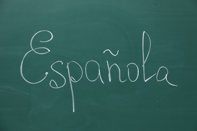 Photo of Word Espanola written with chalk on green board