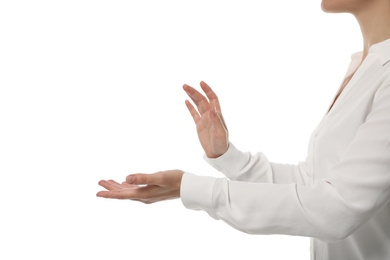 Businesswoman holding something on white background, closeup