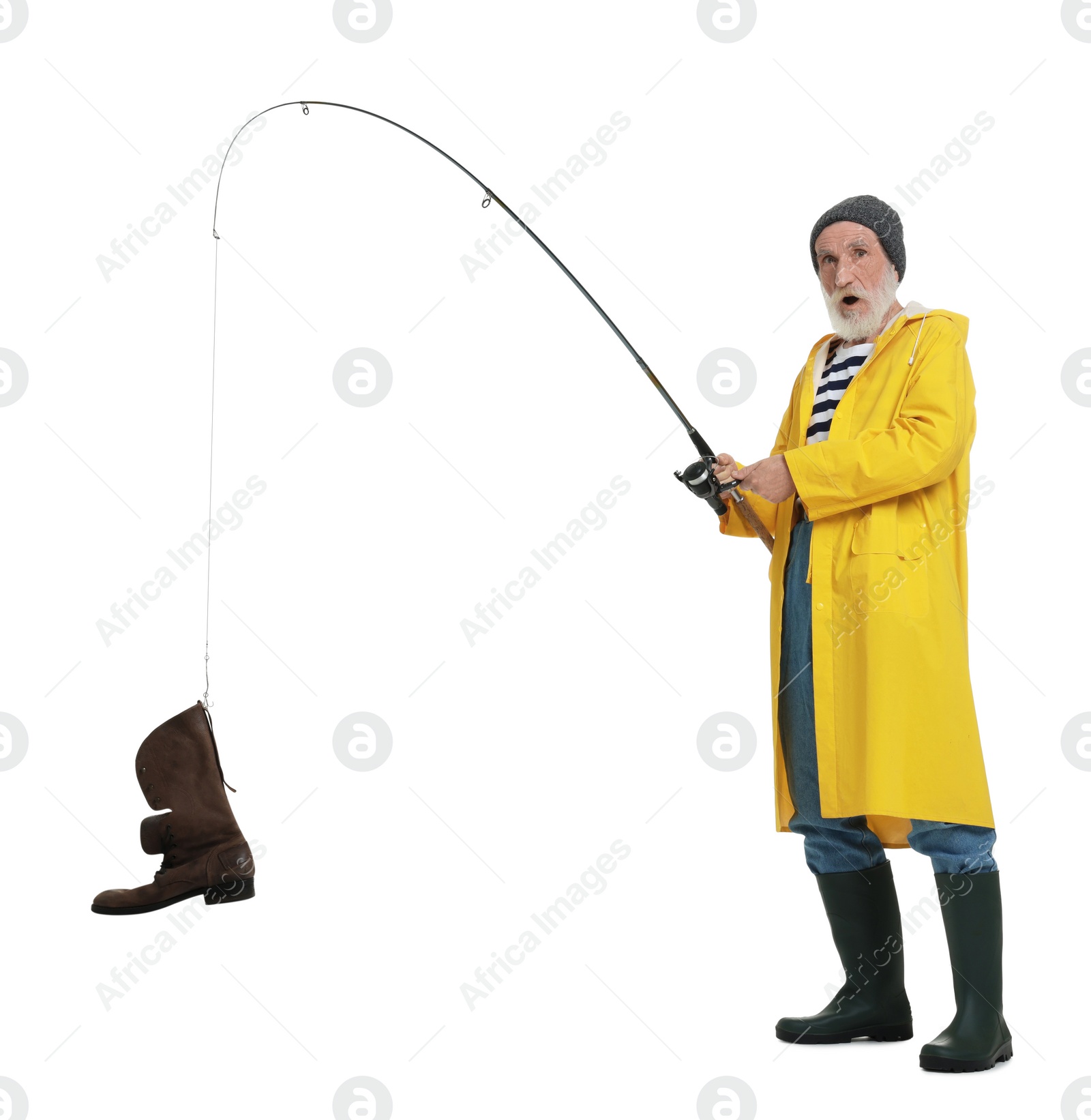 Photo of Shocked fisherman with rod and old boot isolated on white