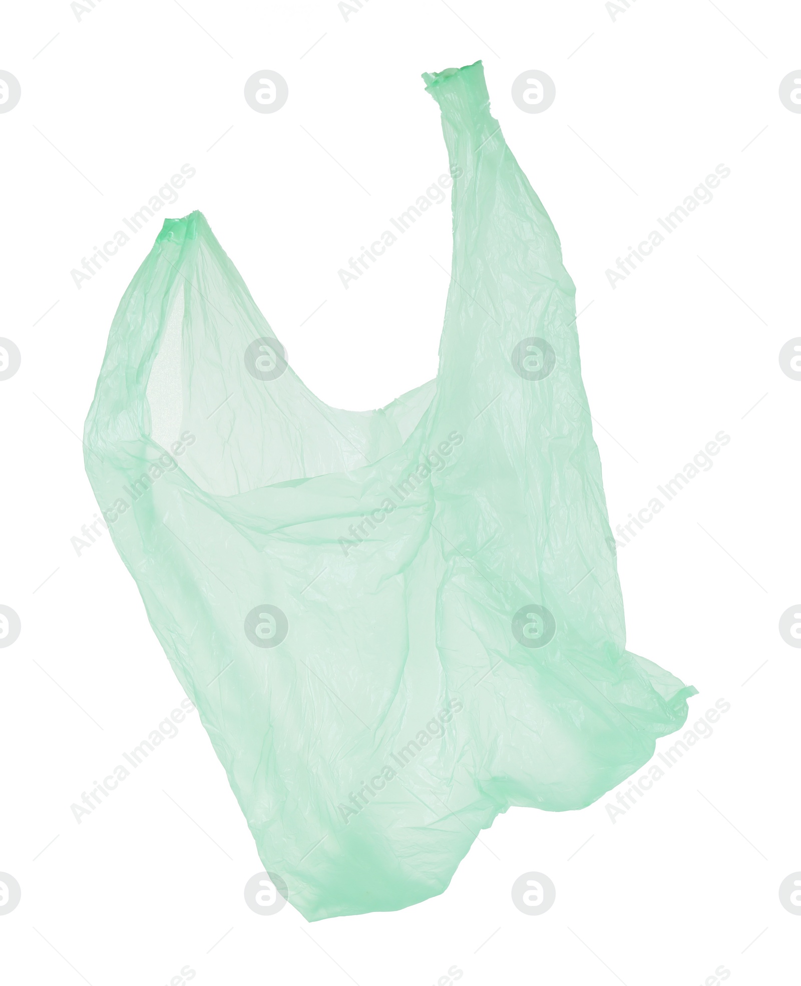 Photo of One light green plastic bag isolated on white