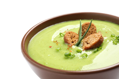 Tasty homemade zucchini cream soup isolated on white, closeup