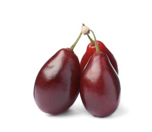 Photo of Fresh ripe dogwood berries on white background