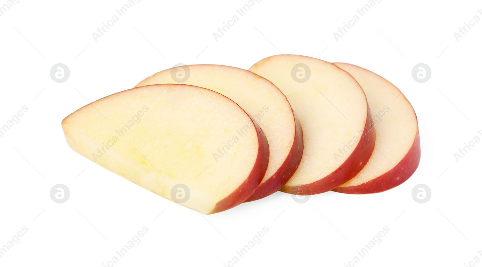 Photo of Slices of ripe red apple isolated on white