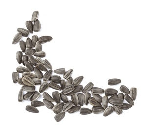 Raw sunflower seeds on white background, top view