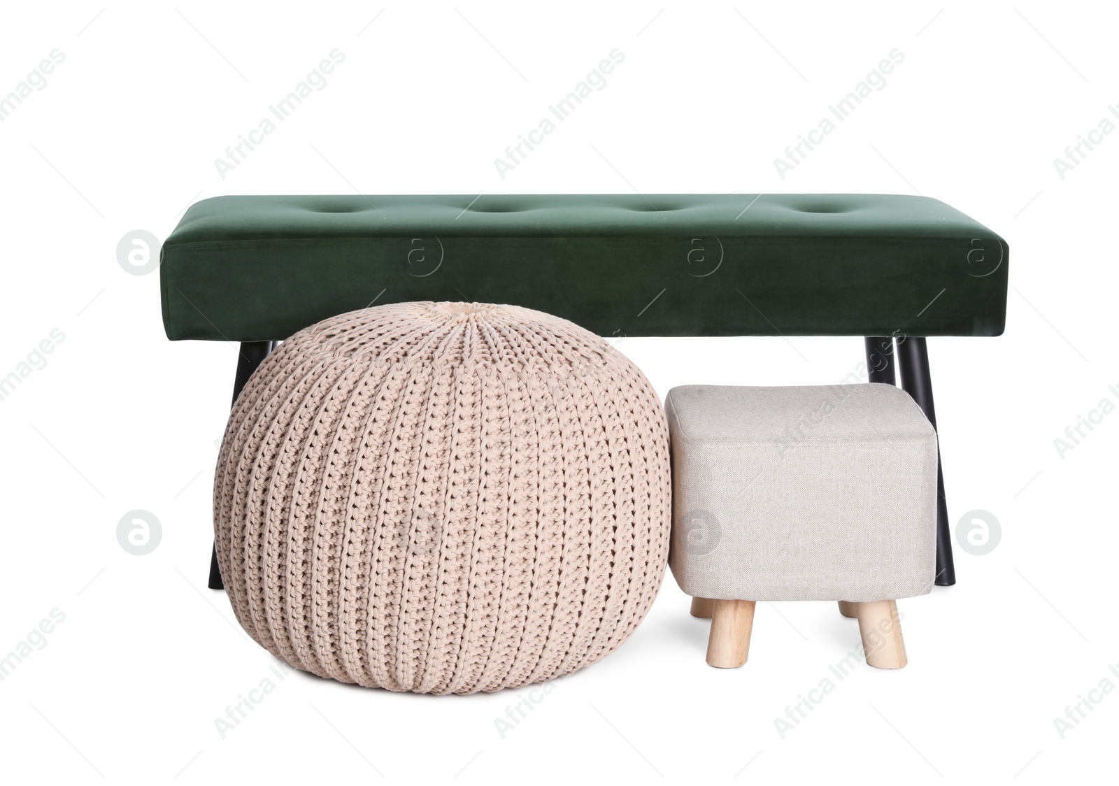 Photo of Different poufs and bench on white background. Home design