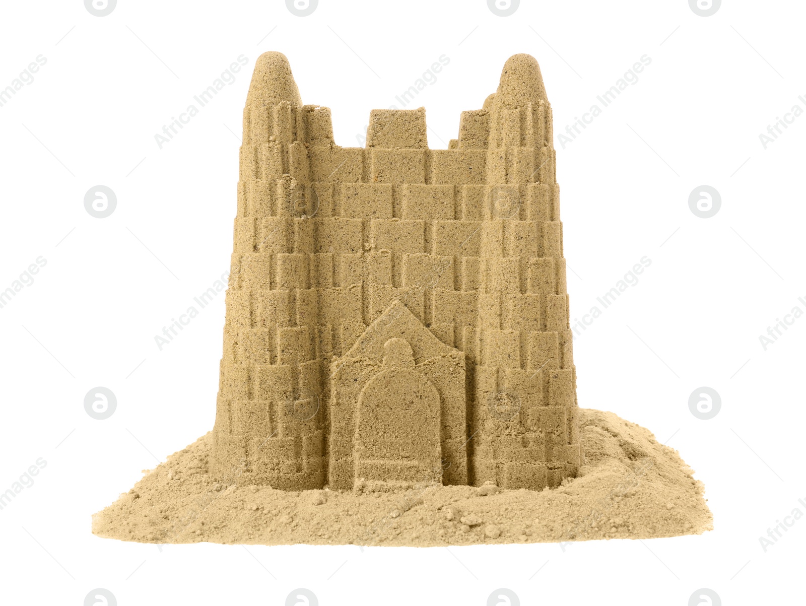 Photo of Pile of sand with beautiful castle isolated on white