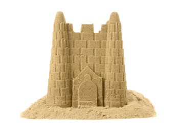 Pile of sand with beautiful castle isolated on white