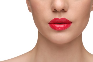 Photo of Woman with bright lip gloss on white background, closeup