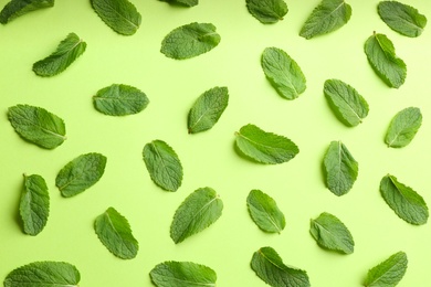 Photo of Fresh mint on green background, flat lay