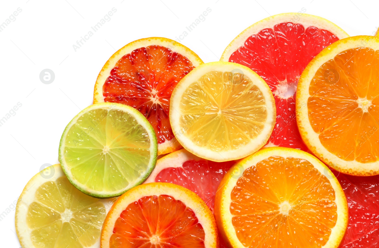 Photo of Slices of fresh citrus fruits on white background, top view