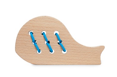 Photo of Wooden whale figure with holes and lace isolated on white. Educational toy for motor skills development