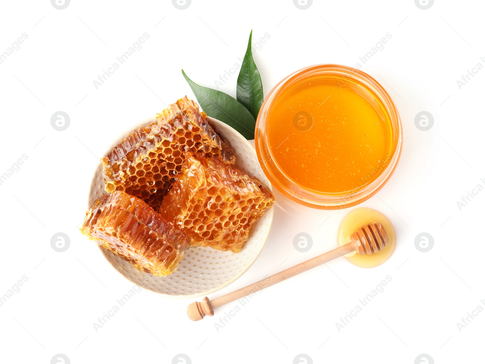 Photo of Composition with jar of honey isolated on white, top view