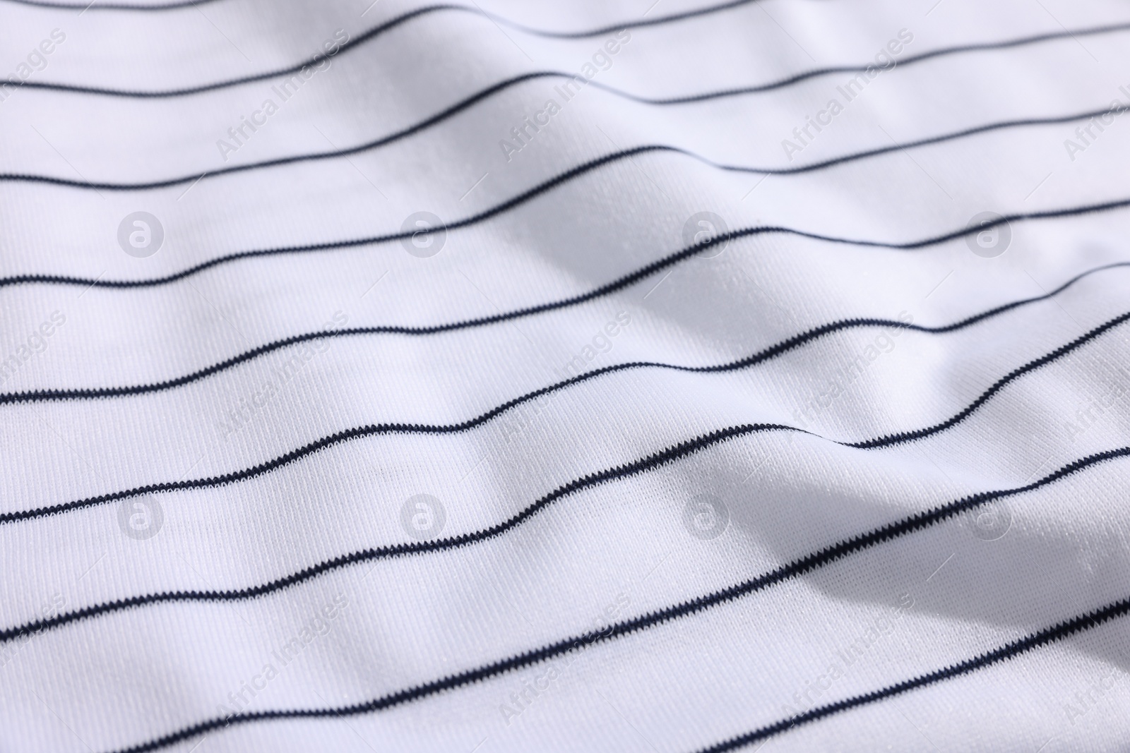 Photo of Striped baseball uniform as background, closeup view