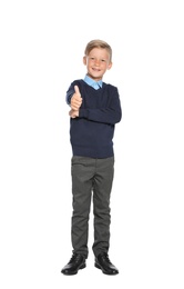 Photo of Little boy in stylish school uniform on white background