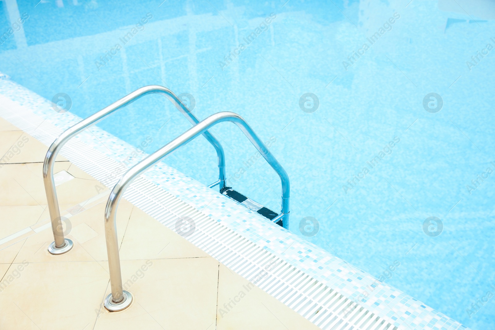 Photo of Ladder with grab bars in swimming pool