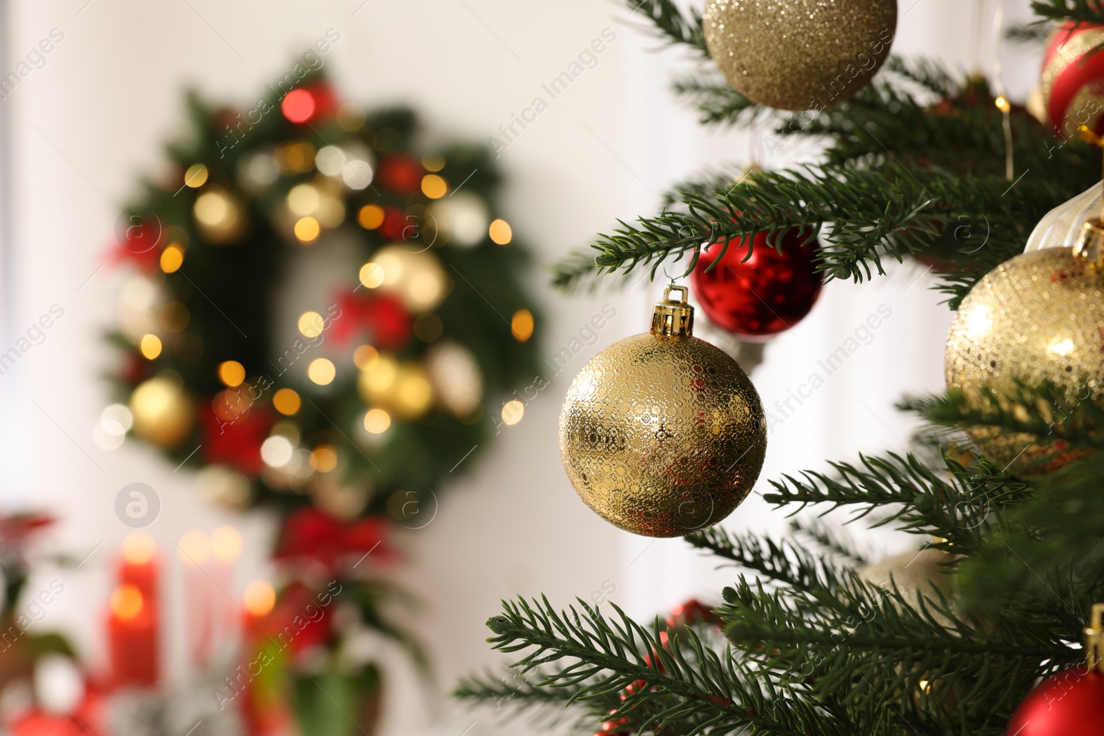 Photo of Christmas tree with beautiful decor indoors, closeup. Space for text