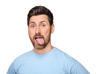 Photo of Man showing his tongue on white background