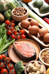 Many different healthy food on table, above view