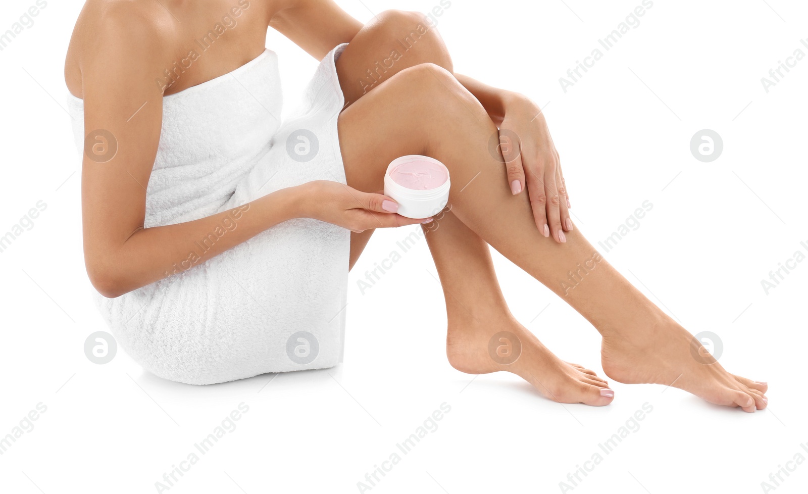 Photo of Young woman with jar of cream on white background. Beauty and body care