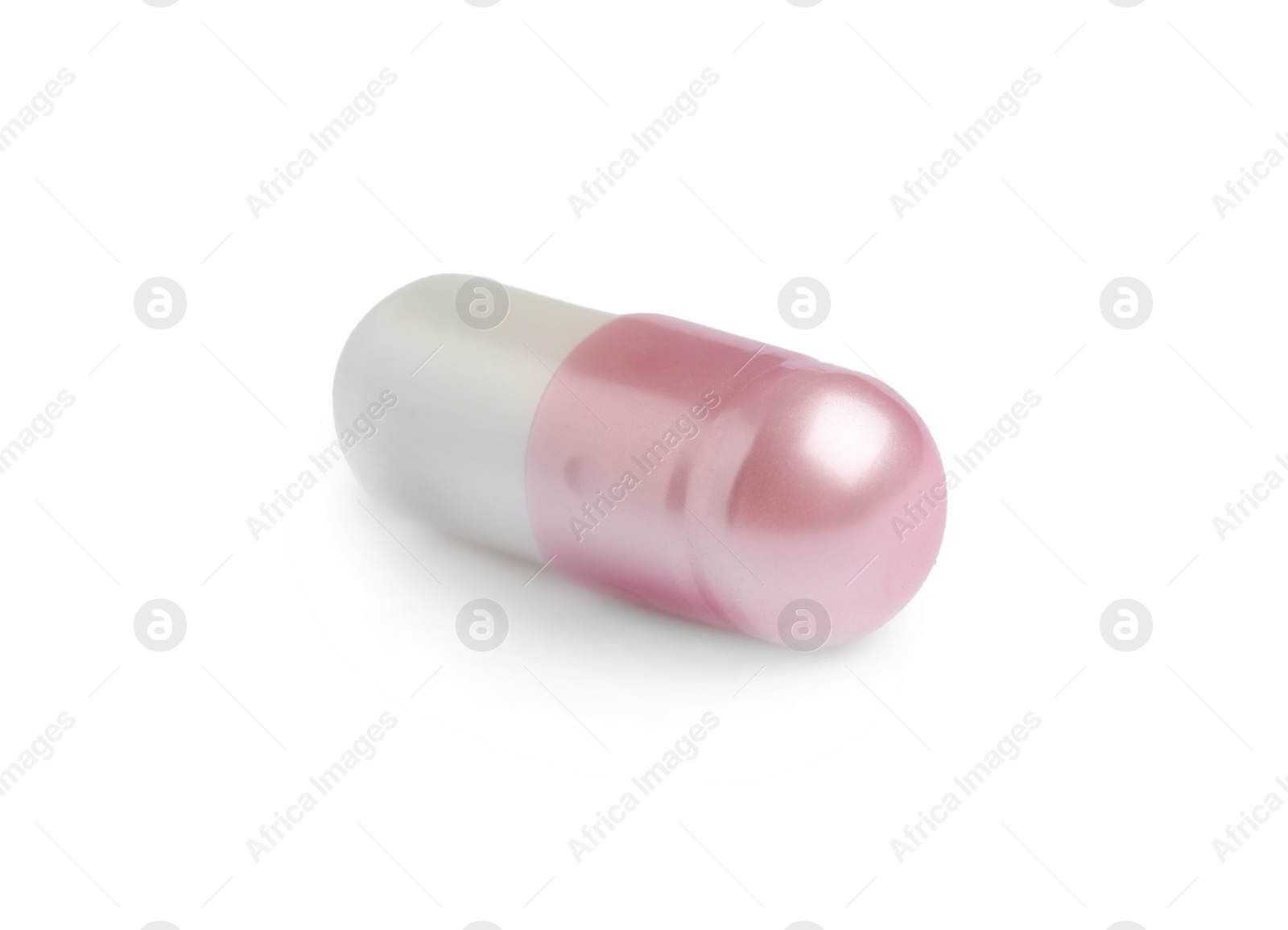 Photo of One pill on white background. Medicinal treatment