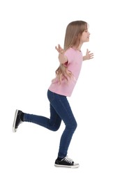 Full length portrait of cute girl running on white background