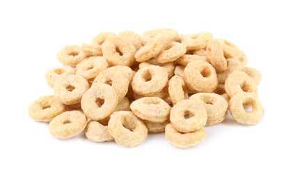 Pile of tasty corn rings on white background. Healthy breakfast cereal