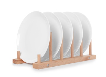 Photo of Rack with clean dishes on white background