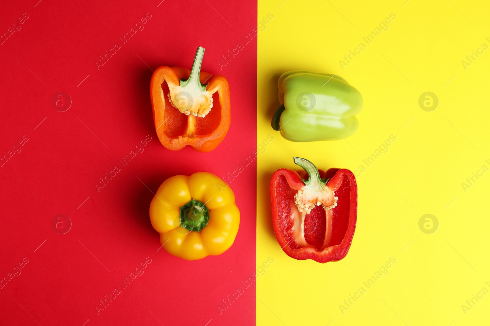 Photo of Flat lay composition with ripe bell peppers on color background