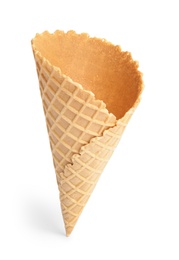 Photo of Empty wafer ice cream cone on white background