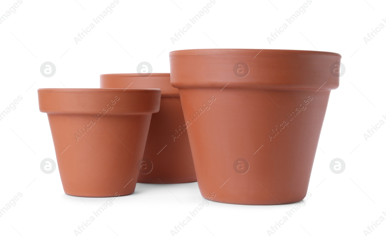 Photo of Stylish terracotta flower pots isolated on white