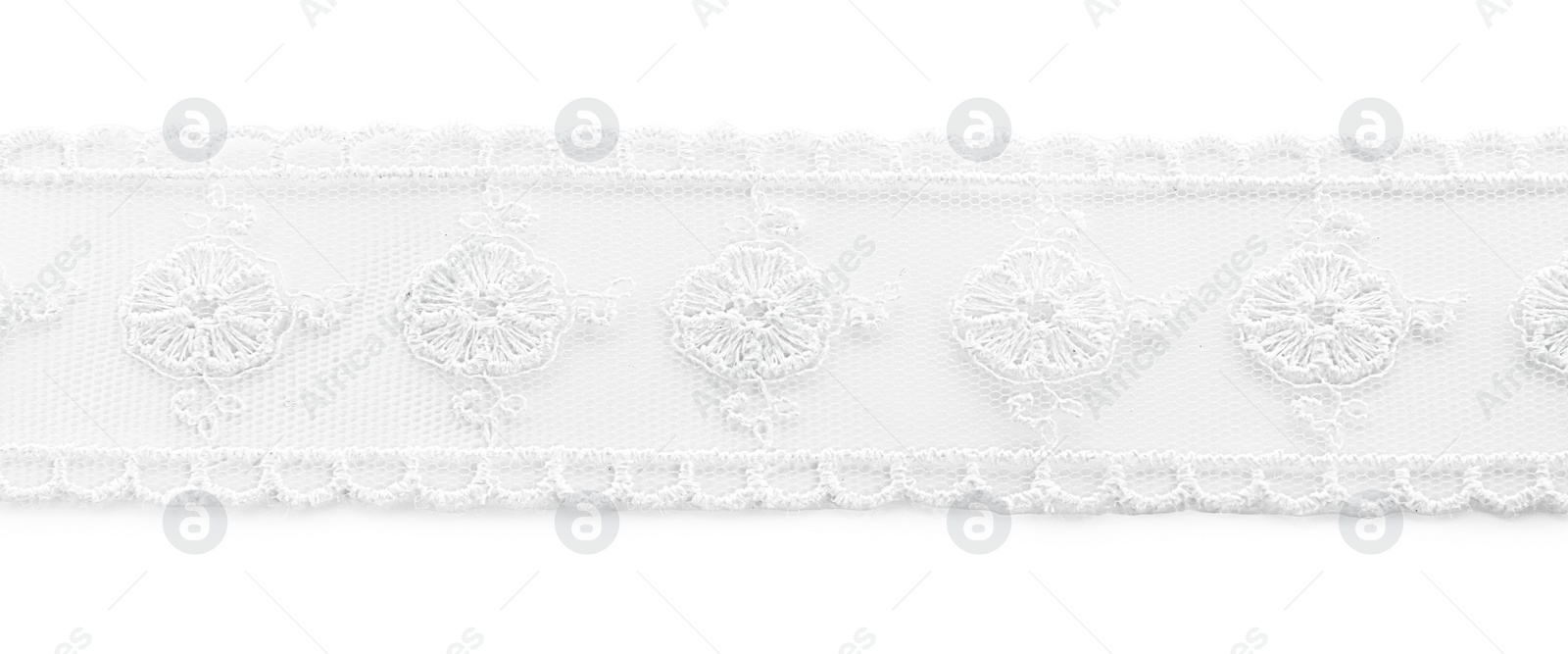 Photo of Beautiful lace with pattern isolated on white, top view