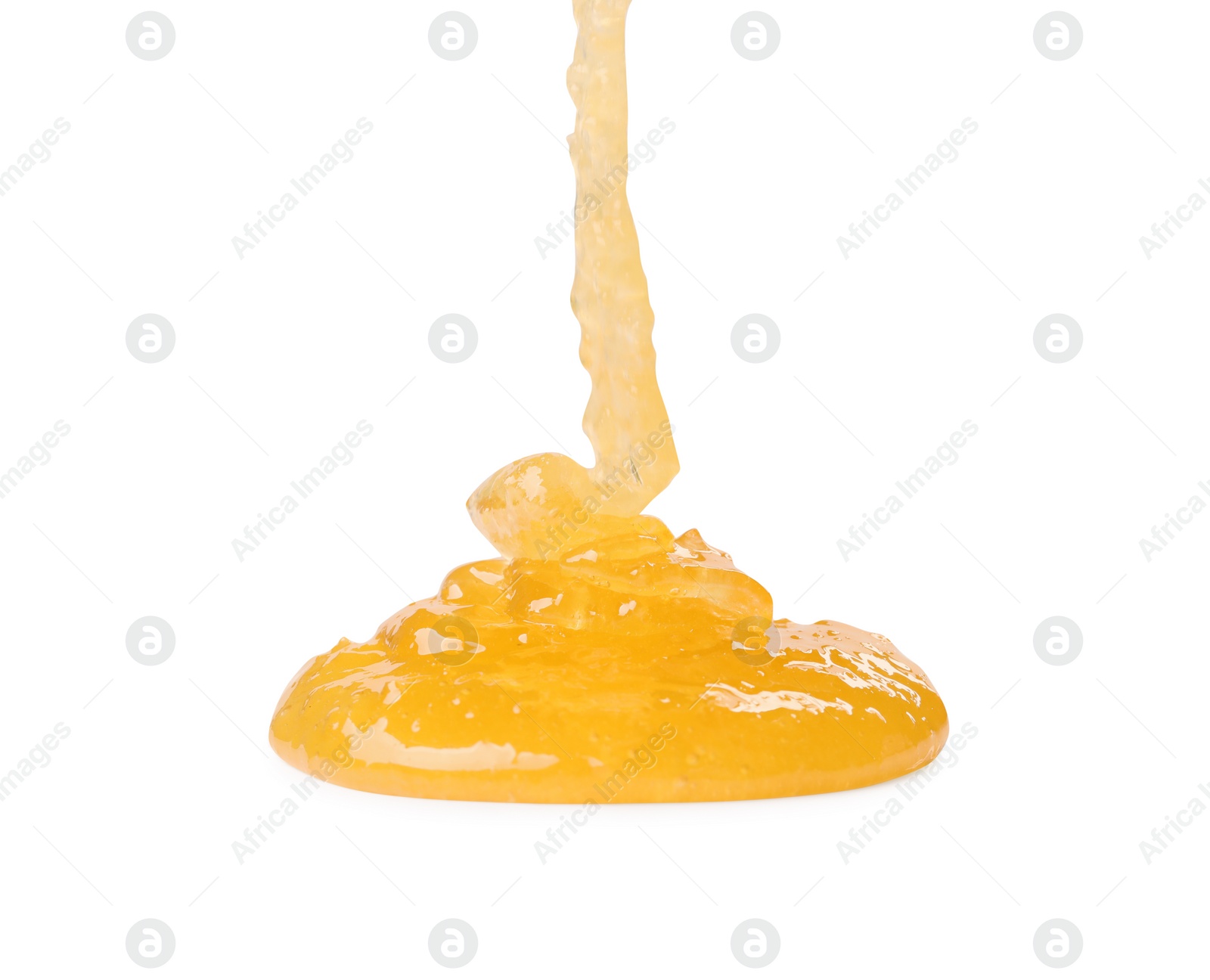 Photo of Pouring tasty natural honey isolated on white