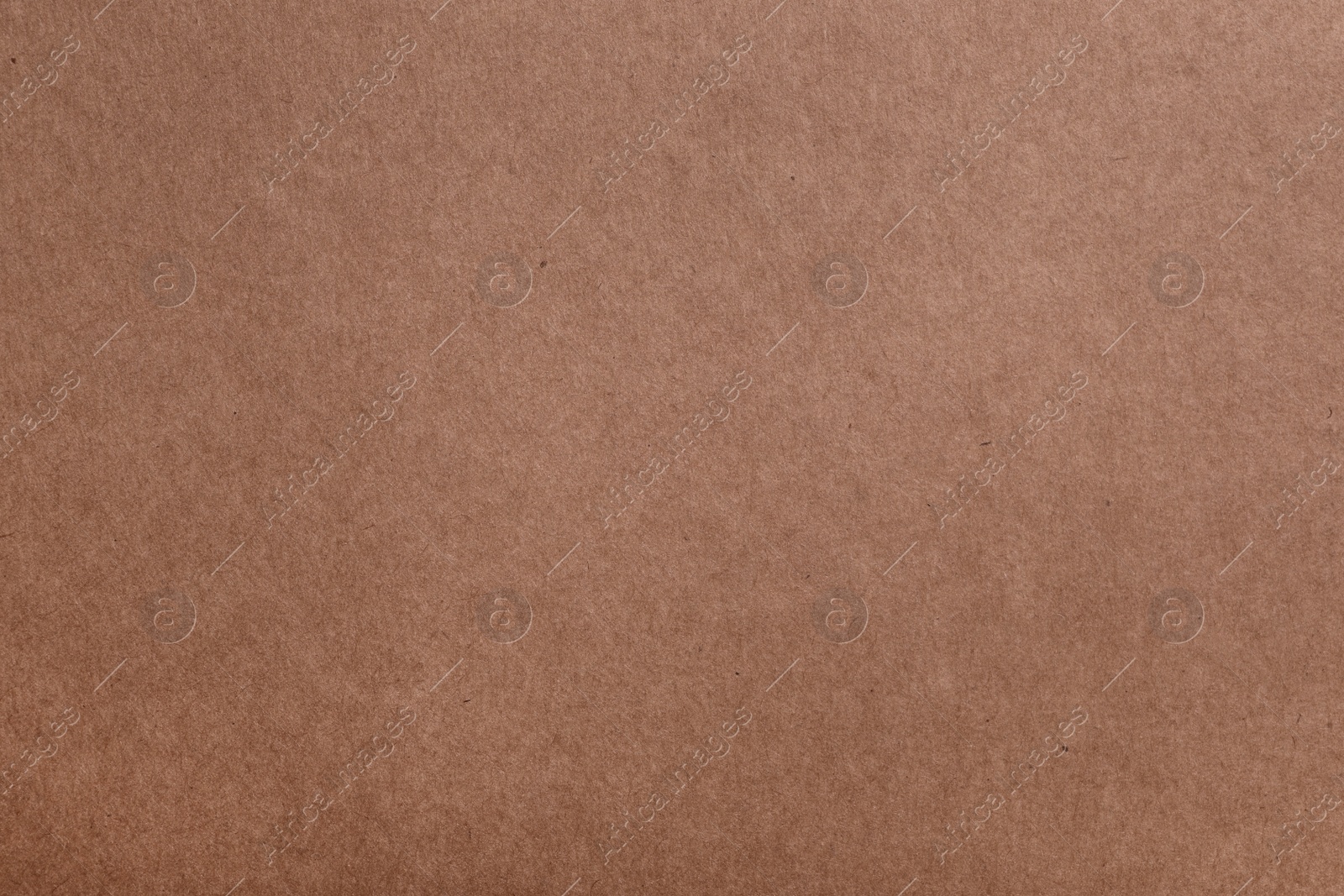 Photo of Texture of kraft paper bag as background, closeup