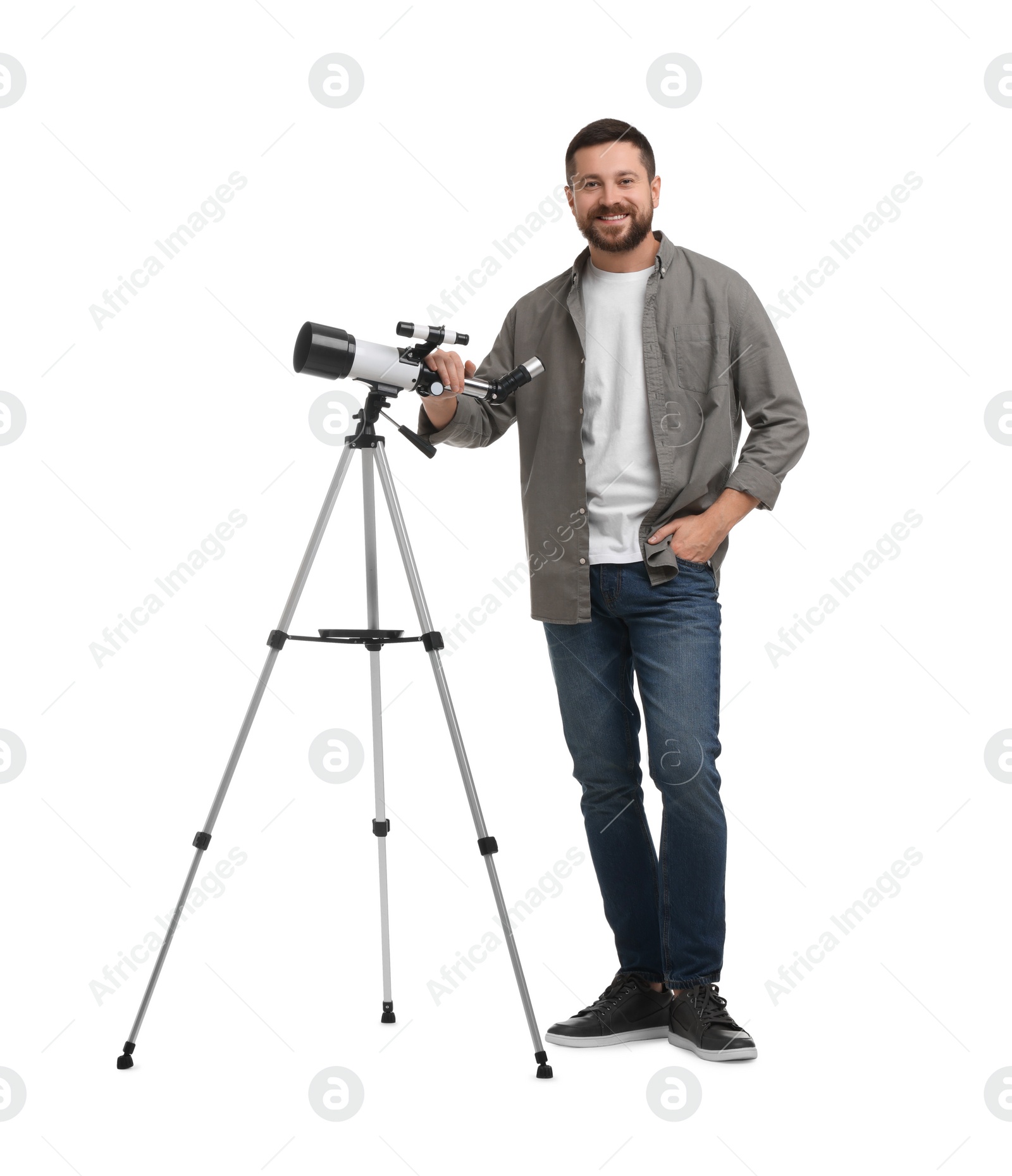 Photo of Happy astronomer with telescope on white background