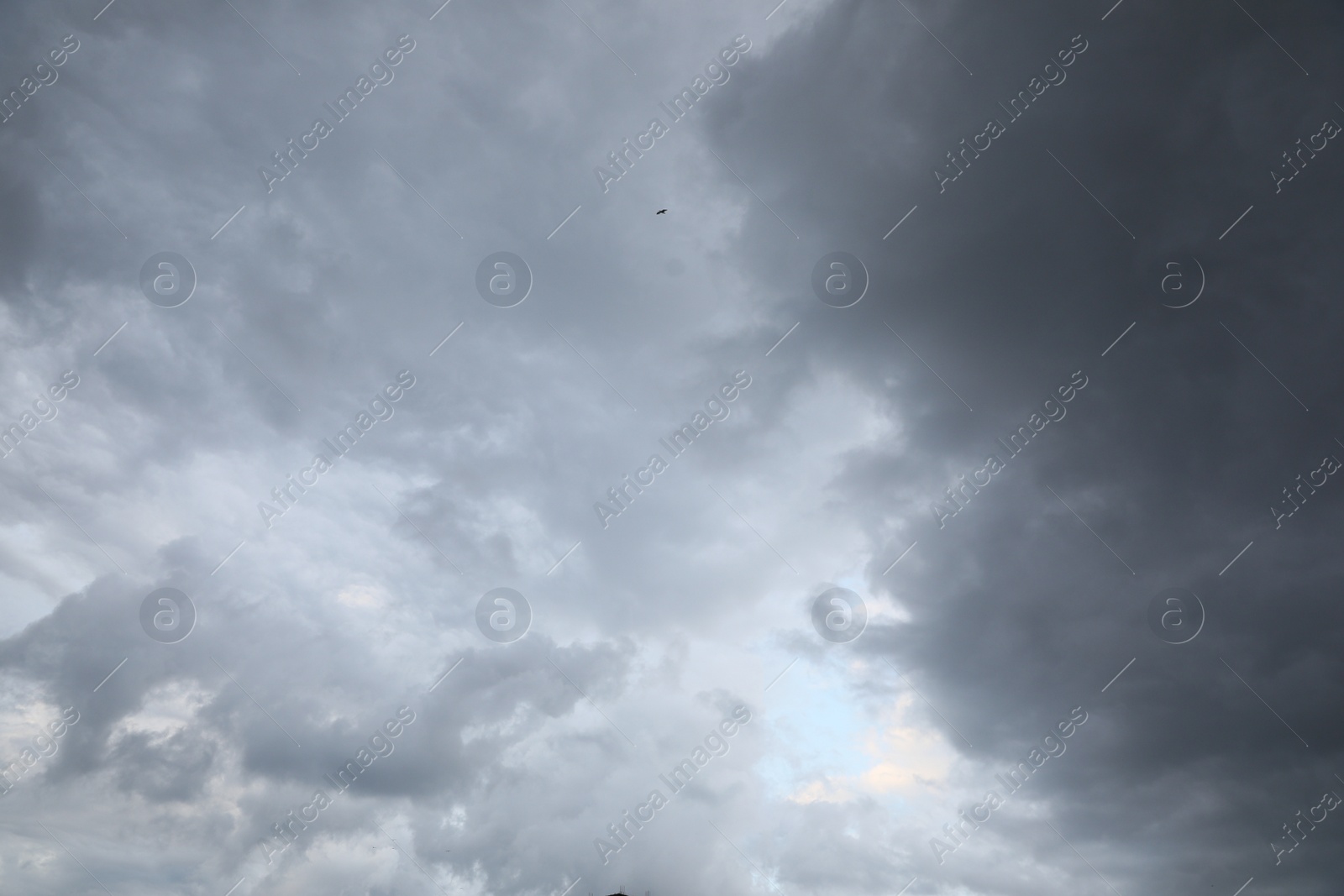 Photo of Picturesque view of sky with heavy rainy clouds