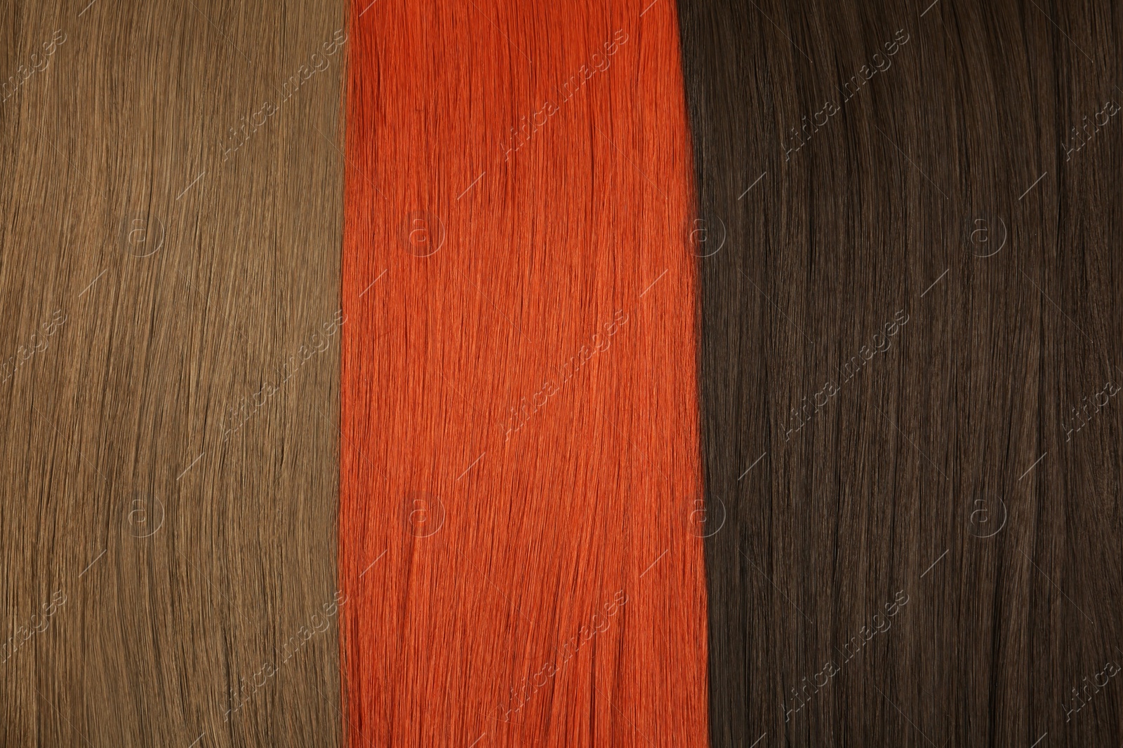 Photo of Hair strands of different color as background, top view