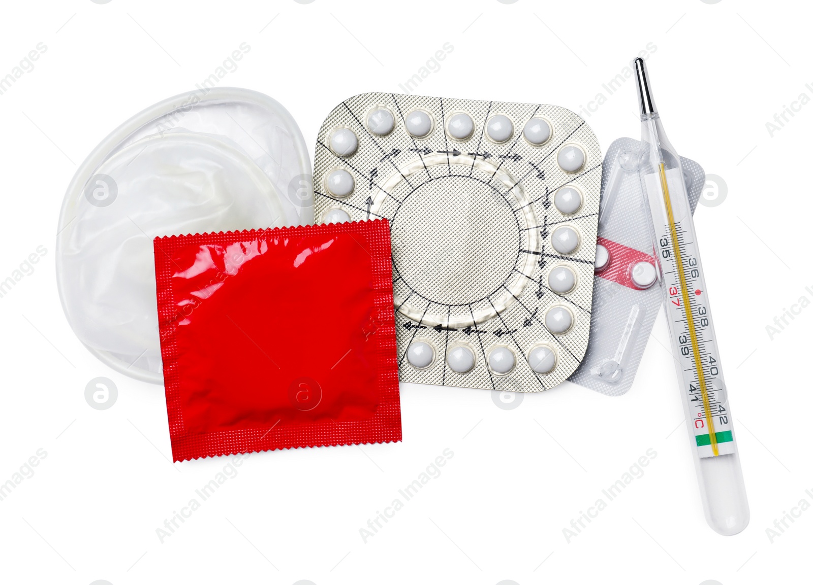 Photo of Contraceptive pills, condoms and thermometer isolated on white, top view. Different birth control methods