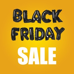 Image of  Phrase BLACK FRIDAY made of foil balloon letters on yellow background