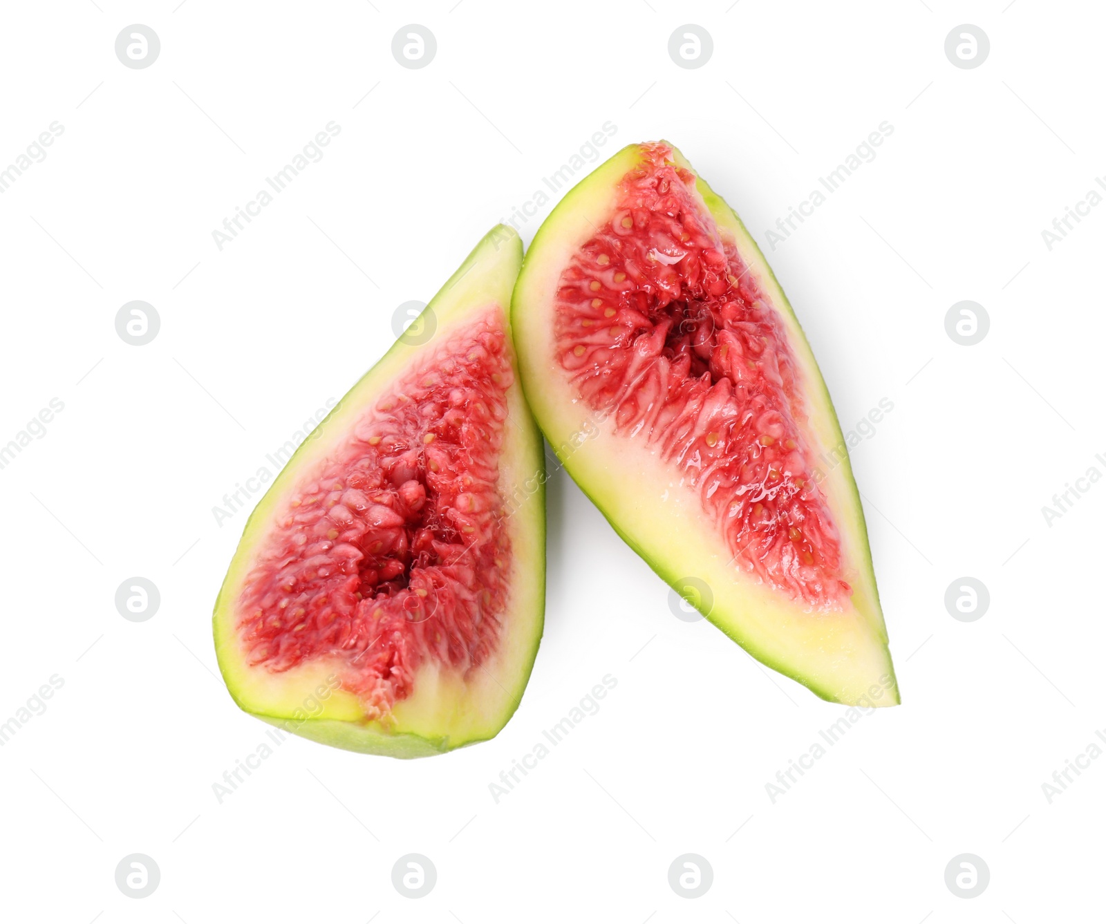 Photo of Cut fresh green fig isolated on white
