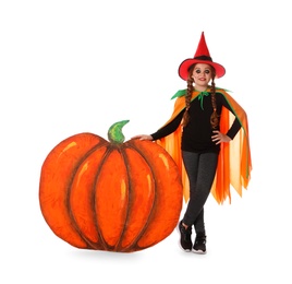 Photo of Cute little girl wearing Halloween costume and decorative pumpkin on white background