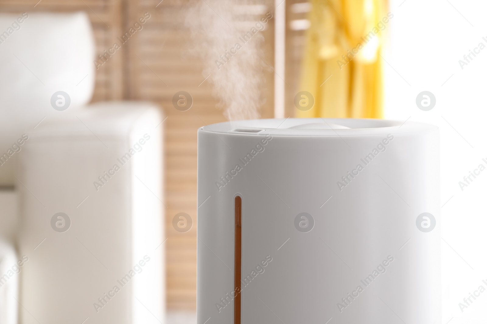 Photo of Modern air humidifier at home, closeup view