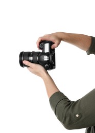 Photo of Photographer holding modern camera on white background, closeup