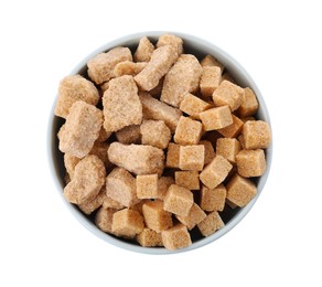 Photo of Bowl with cubes and chunks of brown sugar isolated on white, top view