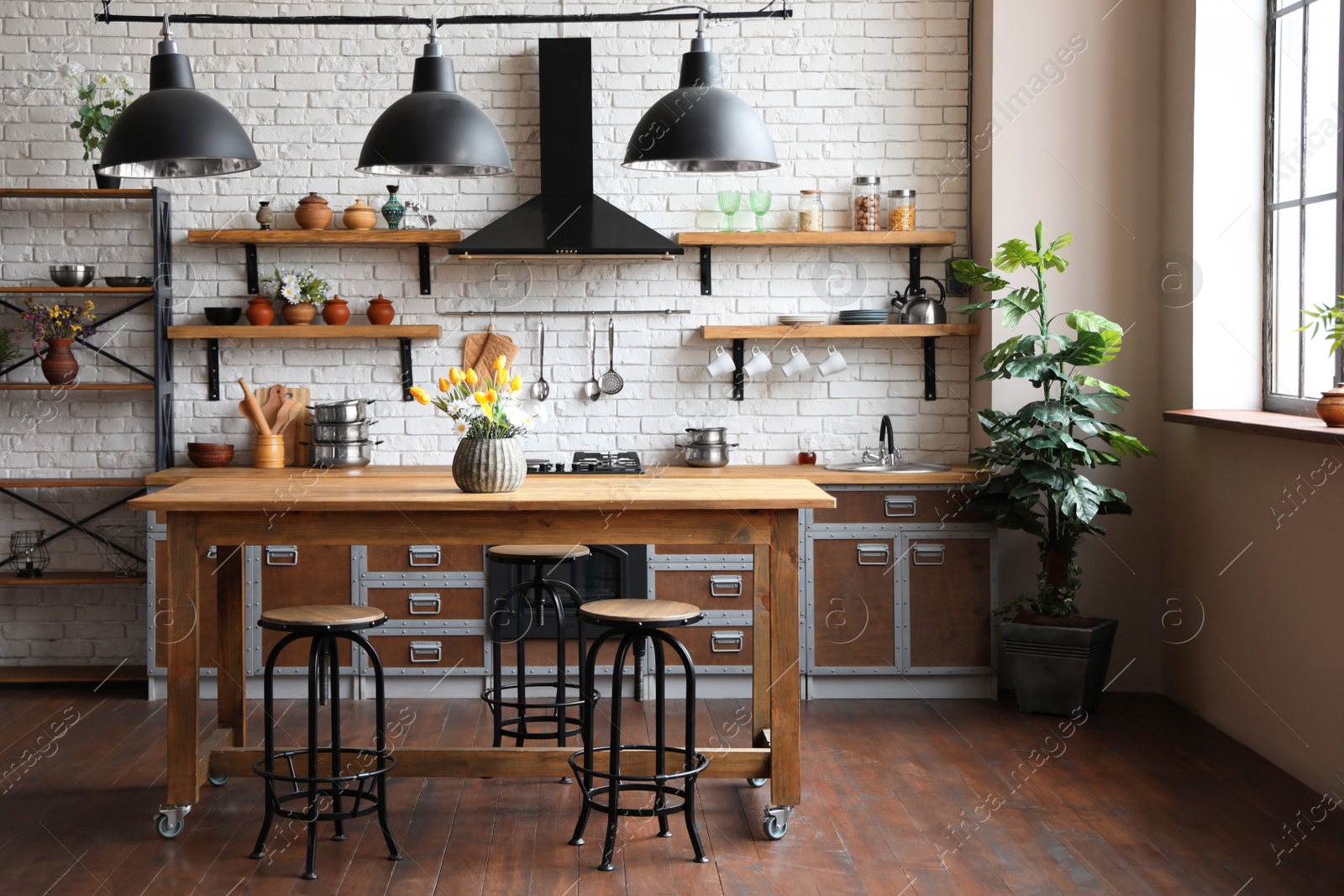 Photo of Beautiful kitchen interior with new stylish furniture