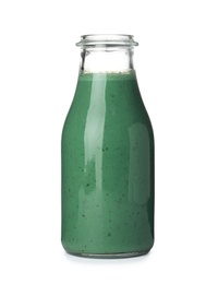 Photo of Bottle of spirulina smoothie on white background