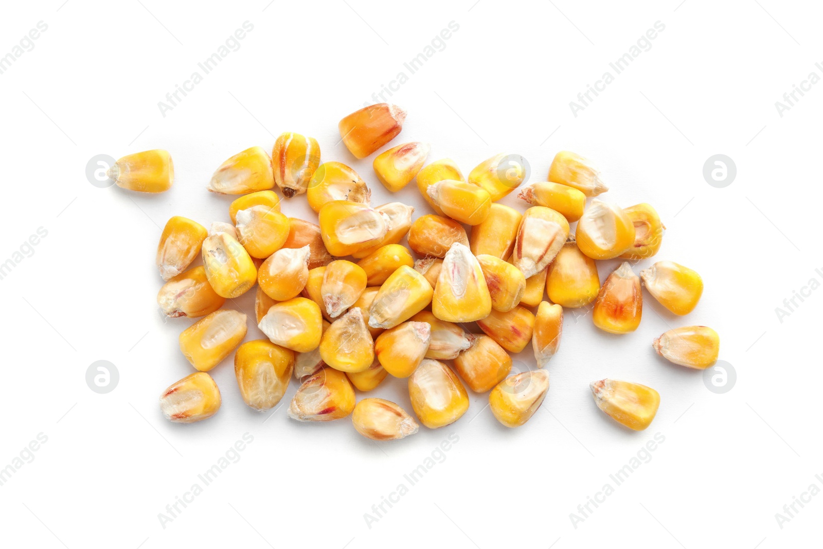 Photo of Dried corn kernels on white background, top view