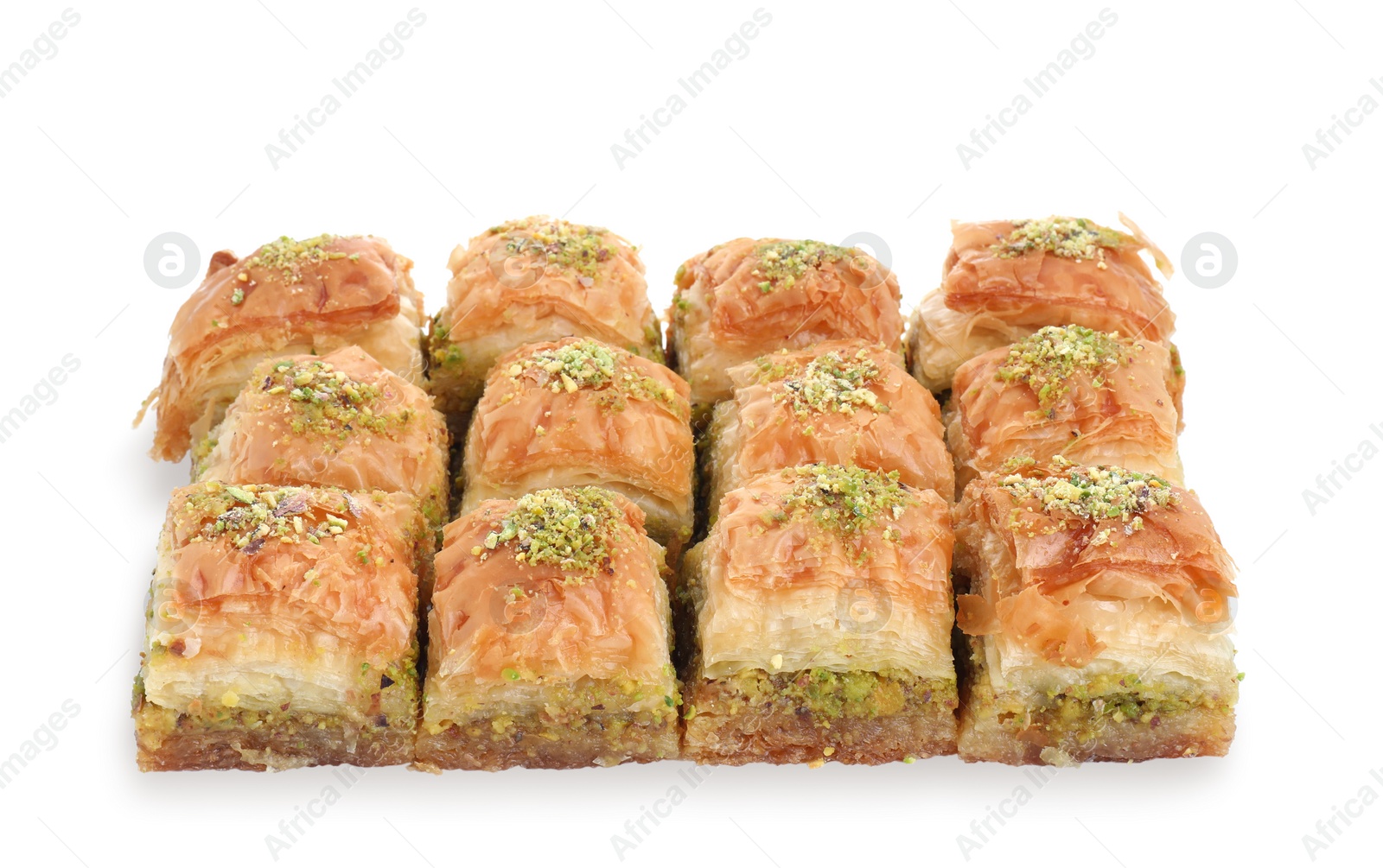 Photo of Delicious fresh baklava with chopped nuts isolated on white. Eastern sweets